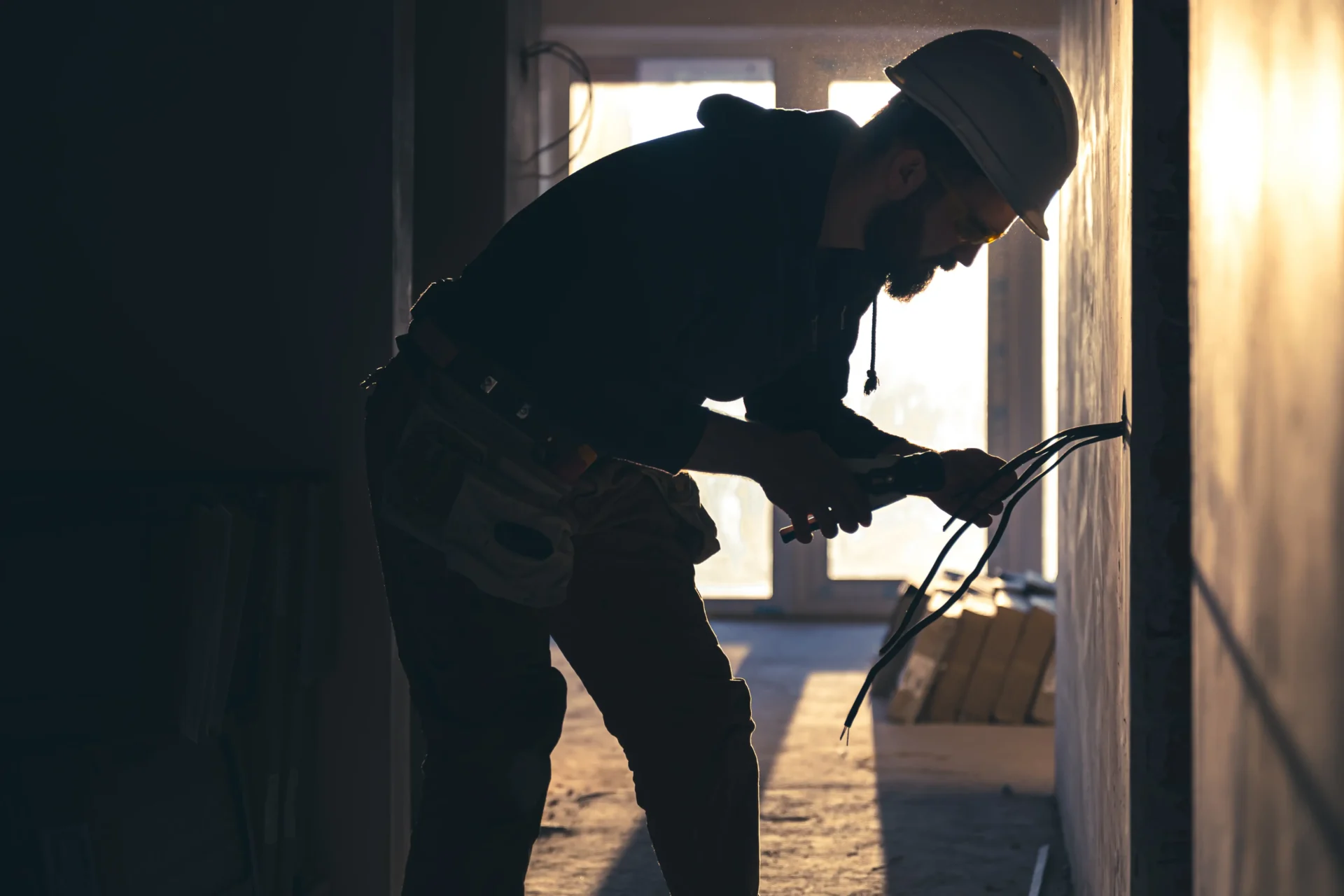 worker-is-cutting-wires-with-lineman-s-pliers-colorado electricians-electrical repair Denver