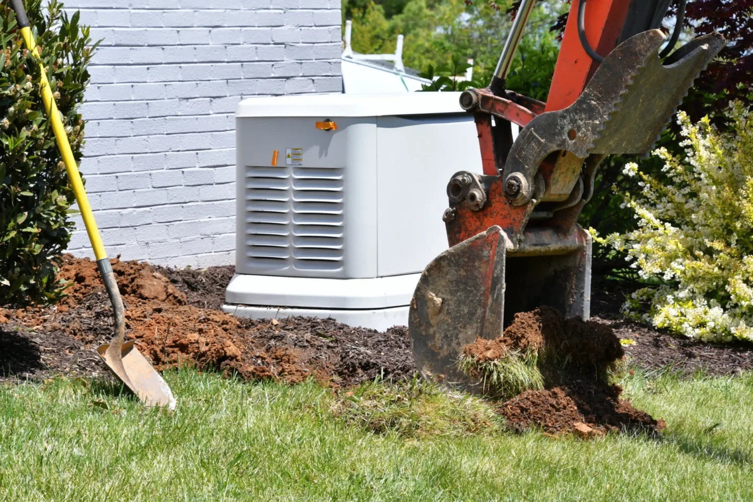 backhoe-digging-dirt-in-lawn-to-install-electrical- Backup Generator-fort collins electrical supply